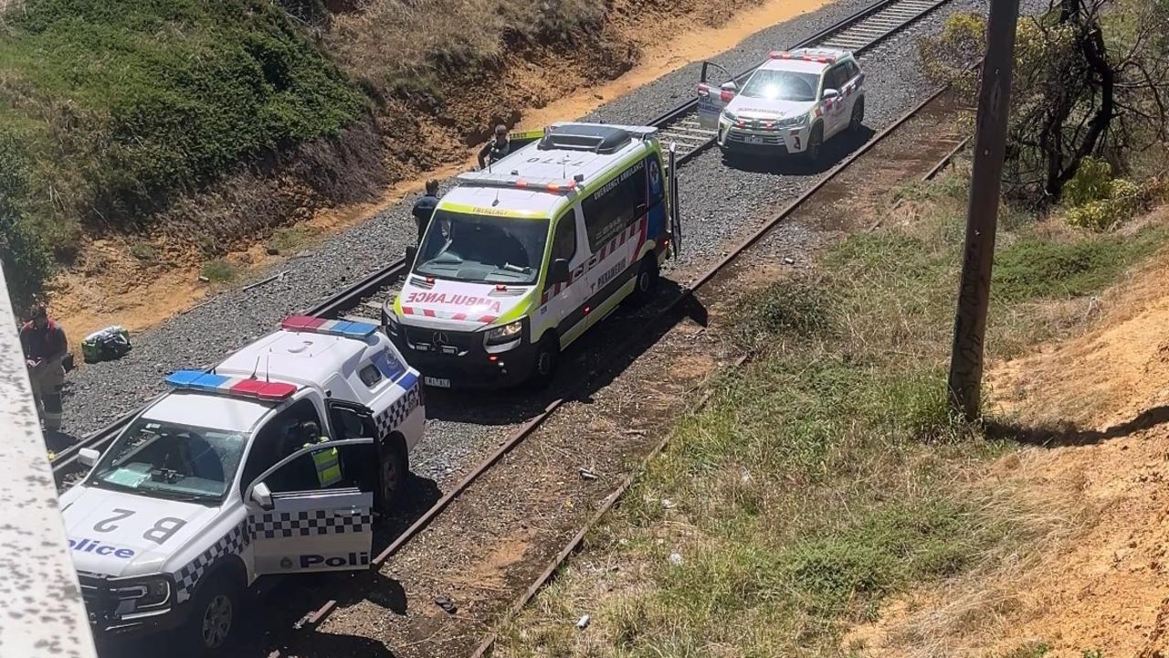 ‘Mayhem’: Traffic chaos as man blocks train tracks