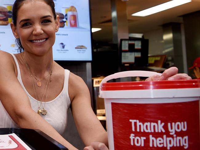 American actor Katie Holmes (right) is seen during a visit to a McDonalds restaurant in Haberfield,  in Sydney, Saturday, November 16, 2019. Katie Homes is in Australia as part of her role as a McHappy Day Ambassador. (AAP Image/Bianca De Marchi) NO ARCHIVING