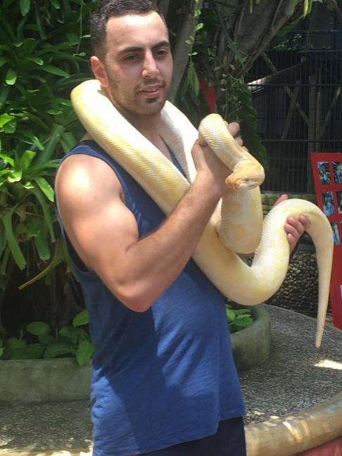 Jaghbir’s Instagram account posing with snakes