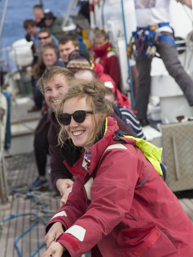 Royal Australian Navy Sail Training Ship Young Endeavour World Voyage crew members close up at tacking stations during demonstrational tacks, as the ship crosses the Atlantic Ocean.