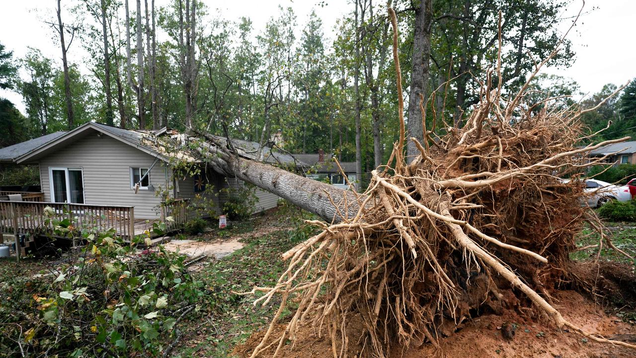 A massive tree seen fallen on a home after the hurricane hit. Picture: Sean Rayford/Getty Images/AFP