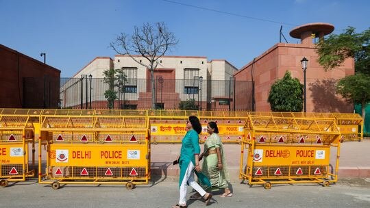 India’s parliament, in background, will require more women from tribal communities and those at the bottom of the Hindu caste ladder as MPs. Picture: Reuters