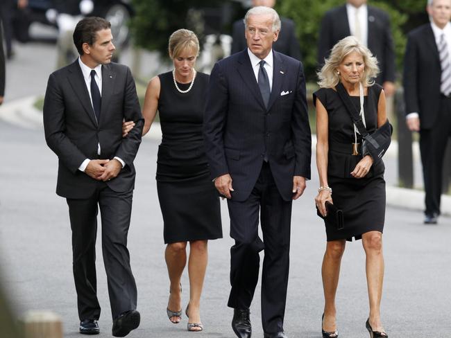 Then US Vice President Joe Biden arrives at Arlington National Cemetery with his wife Dr Jill Biden (right), his son Hunter and his daughter-in-law Kathleen. Picture: Jim Bourg