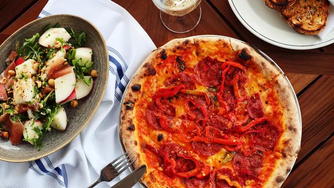 Easy pleasing hits, salads and beer-friendly snacks are the order of the day, including this calabrese pizza. Picture: Rebecca Michael