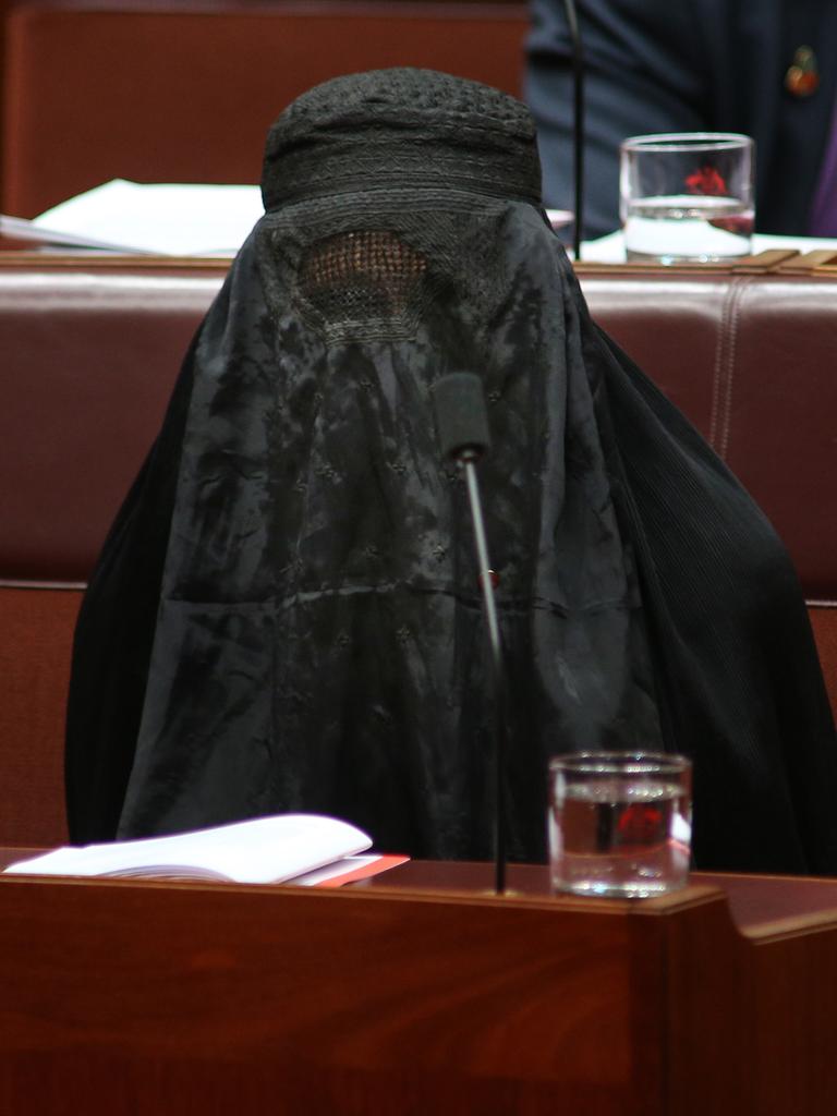 One Nations Leader Senator Pauline Hanson in a black burqa in the Senate in Parliament House in Canberra, 2017. Picture Gary Ramage