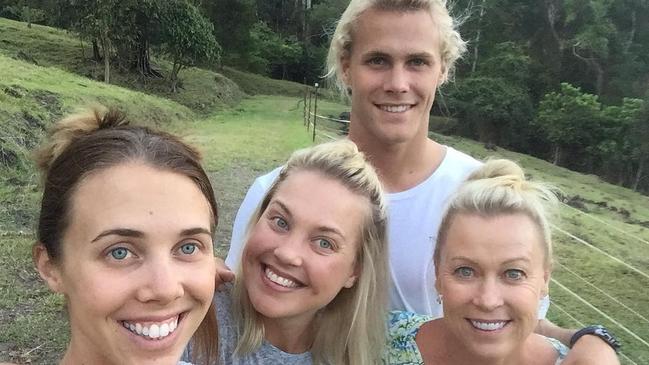 Kenny with sisters Morgan (left) and Jaimi, and mum Lisa Curry. Picture: Instagram