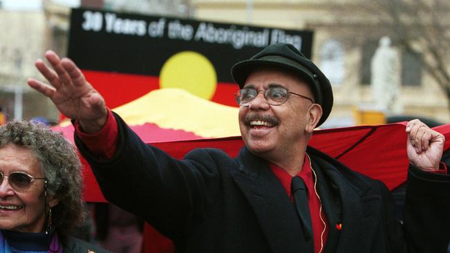 Aboriginal flag designer Harold Thomas at a parade to celebrate the 30th anniversary of the creation of the Aboriginal flag in 2001.