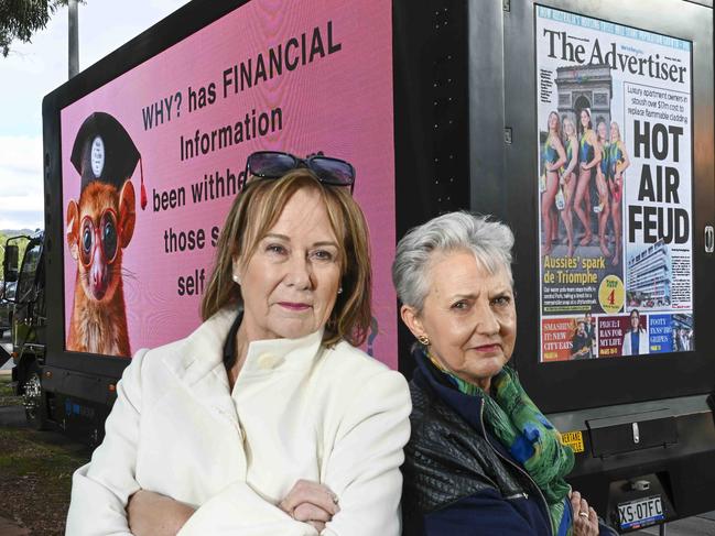 Air Apartment residents Debbie Litchfield and Sylvia Holzapfel near their protest signage upset over the costs of replacing cladding on their building and the bullying tactics of the house committee .Monday,July,22,2024.Picture Mark Brake