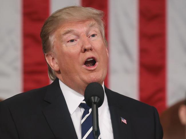 President Trump delivers his first address to a joint session of Congress from the floor of the House of Representatives. Picture: AFP