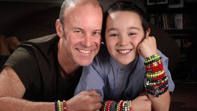 Darcy George, 9 years old has raised $2000 for MS in two weeks through making and selling bracelets after his father Steven George was diagnosed with the disease. He is nominated for a Child of Courage award. Picture: Tony Gough