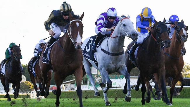 Jockey Tim Clark rides Snitz (left) to victory in race 8, the DeBortoli Wines Takeover Target Stakes, during Gosford Cup Day at Royal Randwick Racecourse in Sydney, Saturday, May 9, 2020. (AAP Image/Dan Himbrechts) NO ARCHIVING, EDITORIAL USE ONLY