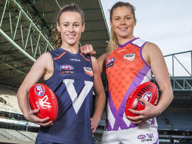 EMBARGOED - CONTACT HERALD SUN PIC DESK / OR SPORTS EDITOR SHAUN PHILLIPS. Herald Sun exclusive, AFL Women's State of Origin sneak peak of the guernsey to be worn. Stars Katie Brennan (Allies) and Alicia Eva (Victoria) in their full kit for Sept 2 State of Origin clash at Etihad Stadium. Picture: Sarah Matray