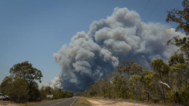 The road into Woodgate was covered with a wall of smoke.