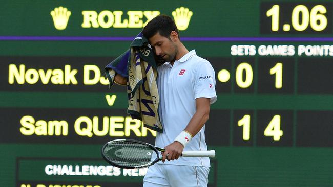 Serbia's Novak Djokovic reacts while playing US player Sam Querrey during their men's singles third round match.