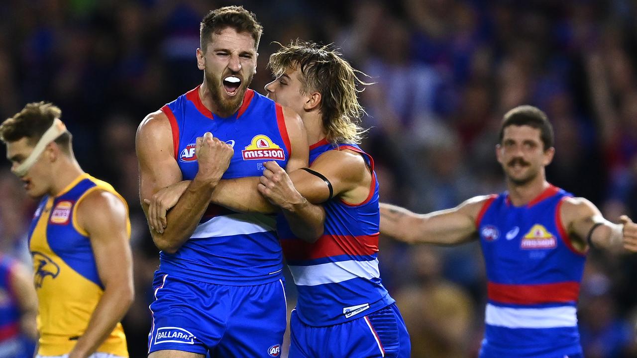 MELBOURNE, AUSTRALIA - MARCH 28: Marcus Bontempelli of the Bulldogs celebrates kicking a goal during the round 2 AFL match between the Western Bulldogs and the West Coast Eagles at Marvel Stadium on March 28, 2021 in Melbourne, Australia. (Photo by Quinn Rooney/Getty Images)