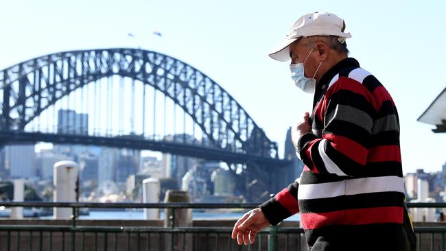 A man is seen wearing a face mask as a preventive measure in Sydney. Picture: NCA NewsWire / Bianca De Marchi