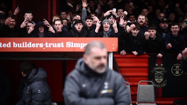 Tamworth fans give Ange Postecoglou a warm welcome. Photo by HENRY NICHOLLS / AFP.