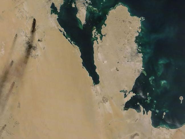 A satellite image provided by NASA shows fires following drone strikes on two major oil installation owned by the state giant Aramco, in eastern Saudi Arabia. Picture: AFP