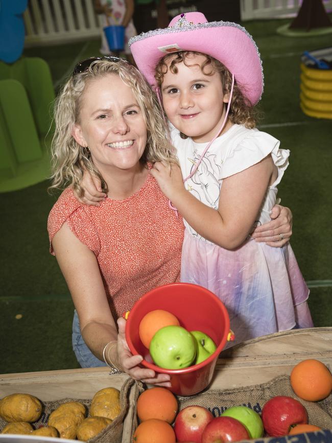 Kristy Majetic and daughter Ava Majetic play in the Little Backyard Farmers area at the Toowoomba Royal Show, Saturday, April 1, 2023. Picture: Kevin Farmer