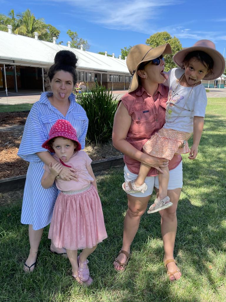 Miranda Nelson, 34, with Charlie Nelson, 5, and Teaghan Mills, 31, with Isabelle Mills, 4, at the Australia Day Mullet Throwing Championship in Ocean Shores on January 26. Picture: Savannah Pocock.