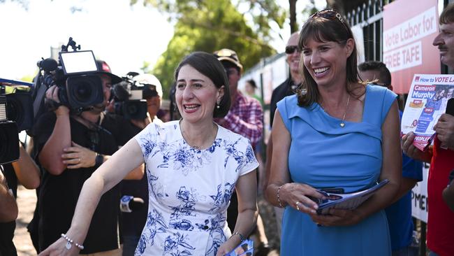 NSW Premier Gladys Berejiklian hands out how to vote cards with Liberal candidate for East Hills Wendy Lindsay on Saturday. Picture: AAP Image/Lukas Coch