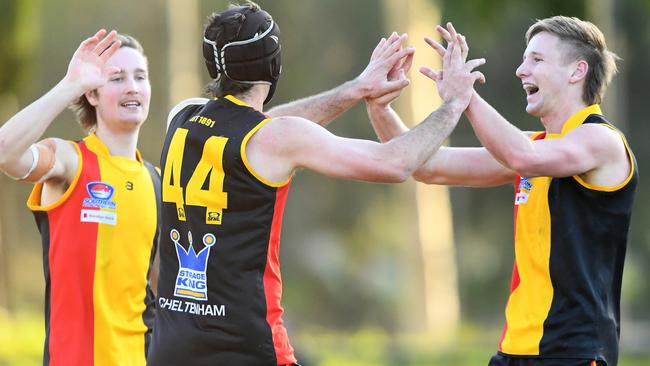 SFNL: Cheltenham’s Tom Davis is congratulated by teammates. Picture: Josh Chadwick