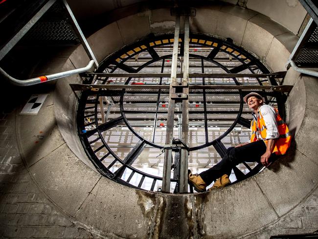 Mathew Pepper inspects the work at Flinders St station. Picture: Tim Carrafa