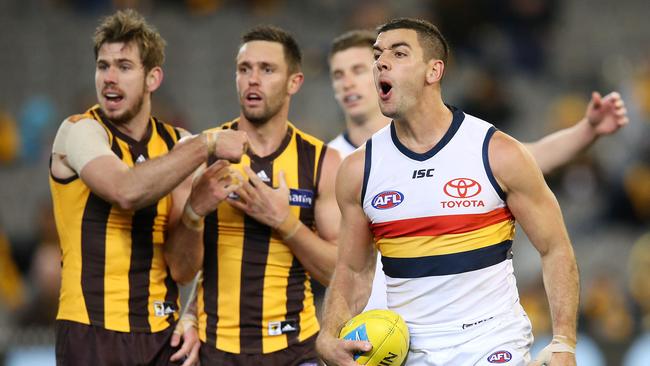 Adelaide's Taylor Walker screams at the field umpire after giving away a free kick during a dirty night for the skipper. Picture: Michael Klein