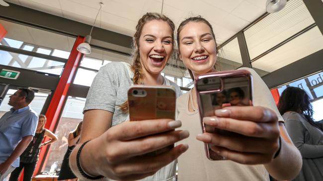 Kayla Gialelis, 17 and Amy Aldred, 17 said the results app and website worked well, getting their results as soon as they logged on at 7am. Picture: Tim Carrafa