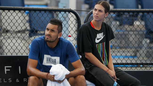 Nick Kyrgios and Ajla Tomljanovic practice together.