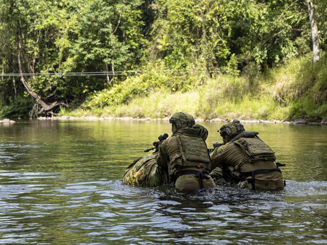 Australian Army soldiers from 1st Battalion, Royal Australian Regiment conduct a mil float during in the annual 3rd Brigade Military Skills competition at Tully Training Area, Queensland. PHOTO: LCPL Riley Blennerhassett