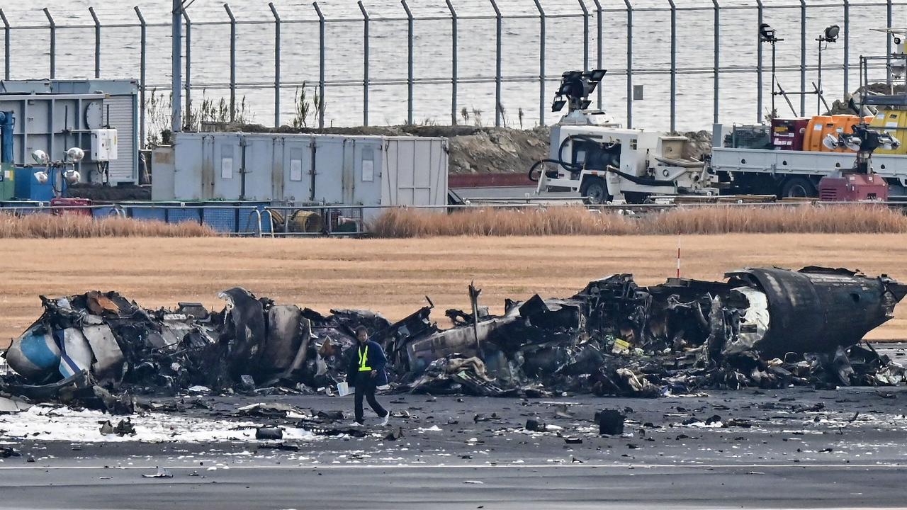 The wreckage of the Coast Guard plane. Picture: Richard A. Brooks / AFP