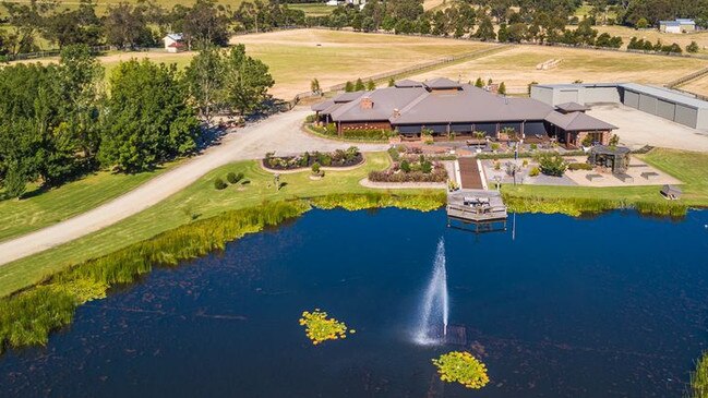 A man-made lake is part of the property.