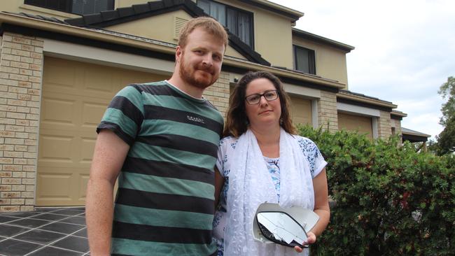 Pacific Pine's couple Sharne Webster and Alex Wright had their house broken into and car stolen, all they have left of their car is a side mirror that came off after a neighbour ran out to try stop the thieves. Photo: Emily Toxward