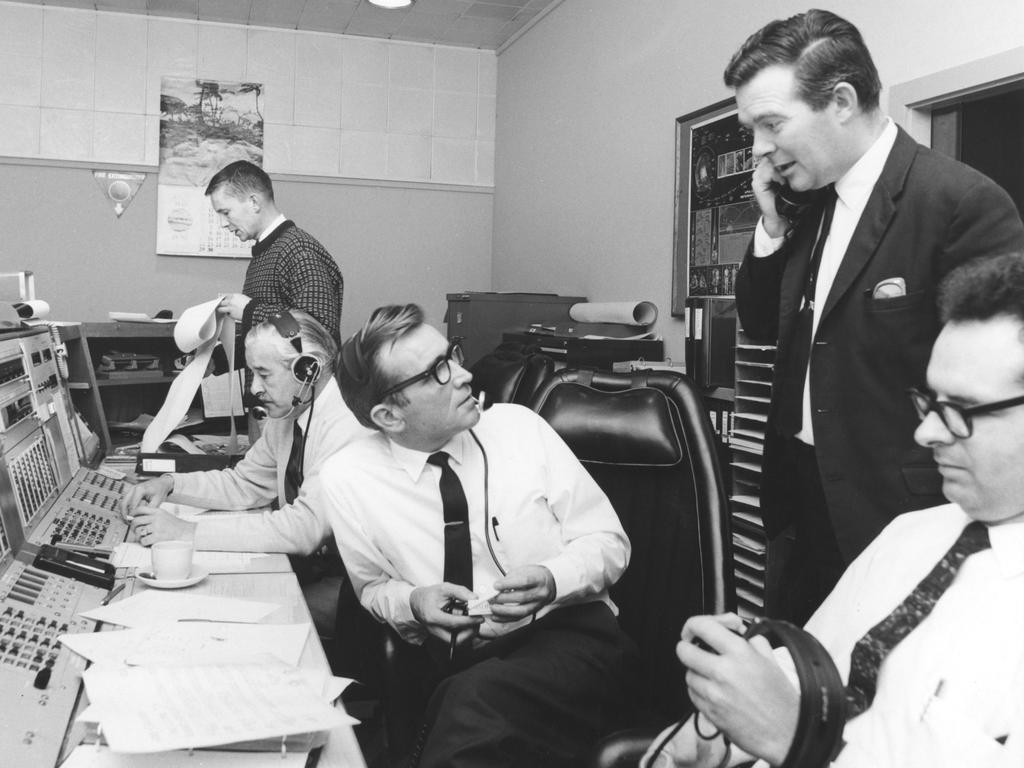 The team at Honeysuckle Creek around the time of the Apollo 11 moon landing. L-R: John Saxon (standing), Ken Lee, Station Director Tom Reid, Mike Dinn and Ian Grant. Picture: AAP Image/Supplied by Honeysuckle Creek, Mike Dinn