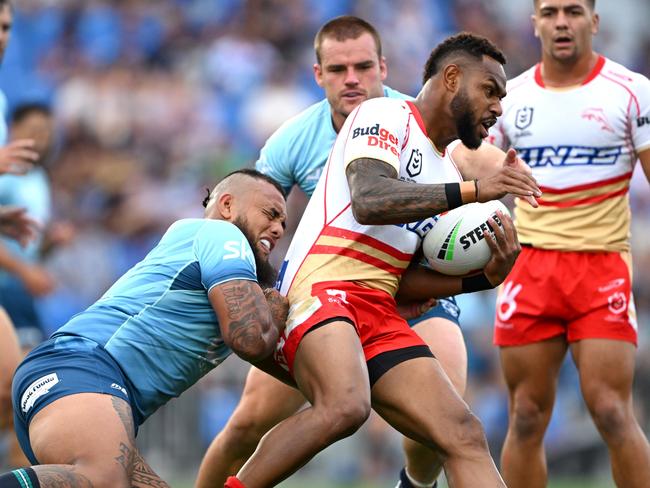 AUCKLAND, NEW ZEALAND - FEBRUARY 24: Hamiso Tabuai-Fidow of the Dolphins charges forward during the NRL Pre-season challenge match between New Zealand Warriors and Dolphins at Go Media Stadium Mt Smart on February 24, 2024 in Auckland, New Zealand. (Photo by Hannah Peters/Getty Images)