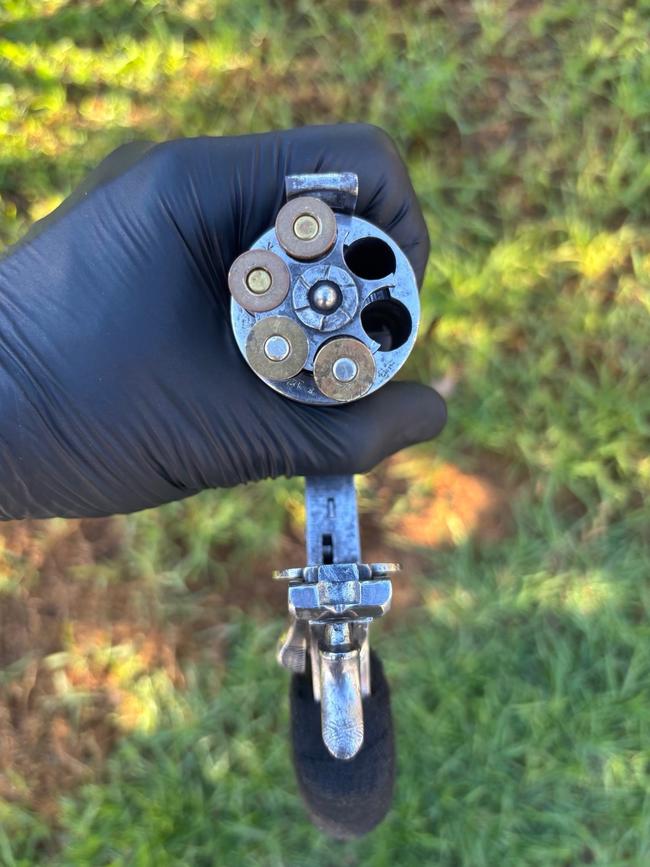 Police allegedly found a clandestine laboratory as well as the loaded gun.