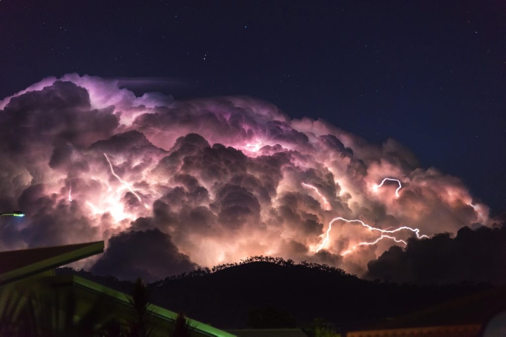 Rocky resident took 20 photos of stormy sky stained purple | The Courier  Mail