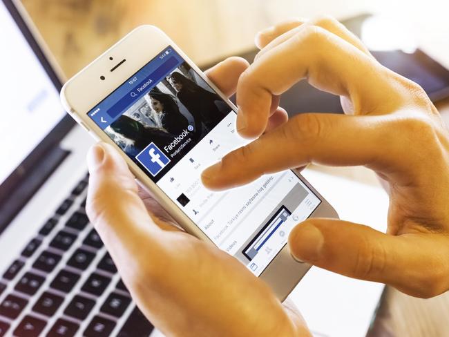 Istanbul, Turkey - January 13, 2016: Person holding a brand new Apple iPhone 6s with Facebook profile on the screen. Facebook is a social media online service for microblogging and networking, founded in February 4, 2004.