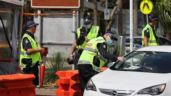 Police at the Queensland border in Griffith Street, Coolangatta. Picture: NIGEL HALLETT