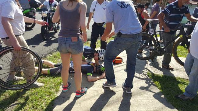 A rider receives treatment after the crash.