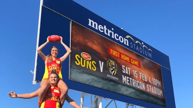 Gold Coast Suns AFLW players Jordann Hickey with teammate Kalinda Howarth on her shoulders. Picture: GOLD COAST SUNS