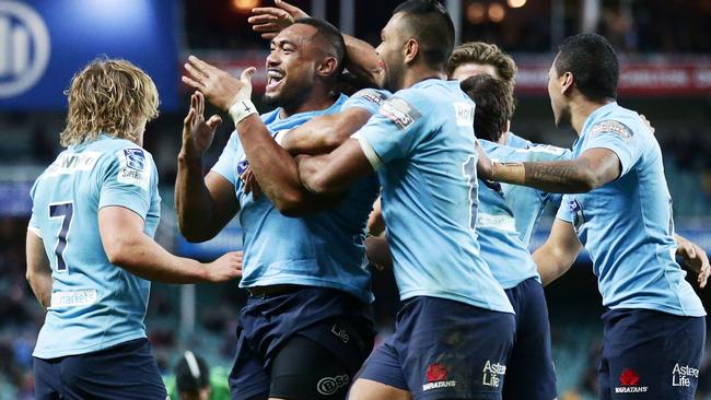 SYDNEY, AUSTRALIA - JULY 06: Sekope Kepu of the Waratahs celebrates with team mates after scoring a try during the round 18 Super Rugby match between the Waratahs and the Highlanders at Allianz Stadium on July 6, 2014 in Sydney, Australia. (Photo by Matt King/Getty Images)