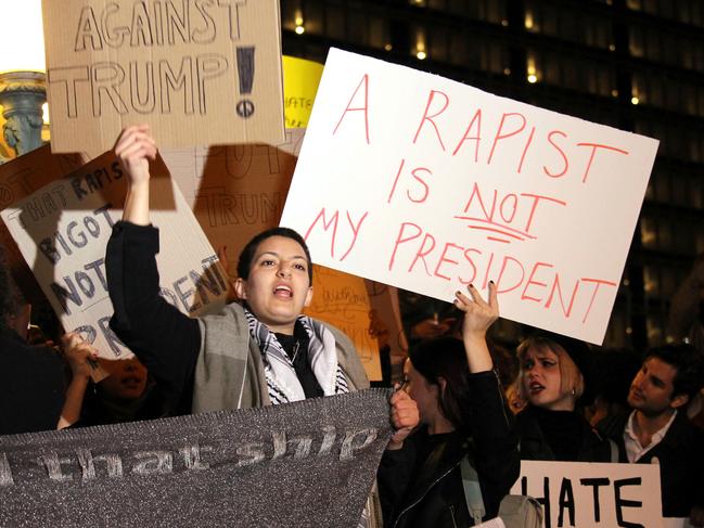 People take part in a protest near the Trump tower, against President-elect Donald Trump, in Chicago, Illinois on November 9, 2016. Picture: AFP
