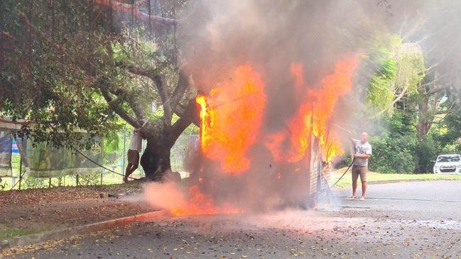 A QFES spokeswoman said the burning caravan set alight a nearby tree.