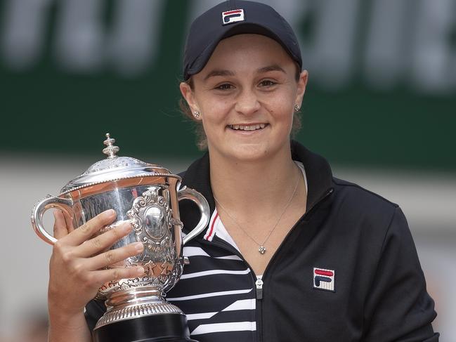 Jun 8, 2019; Paris, France; Ashleigh Barty (AUS) poses with the trophy after her match against Marketa Vondrousova (CZE) on day 14 of the 2019 French Open at Stade Roland Garros. Mandatory Credit: Susan Mullane-USA TODAY Sports - 12858632