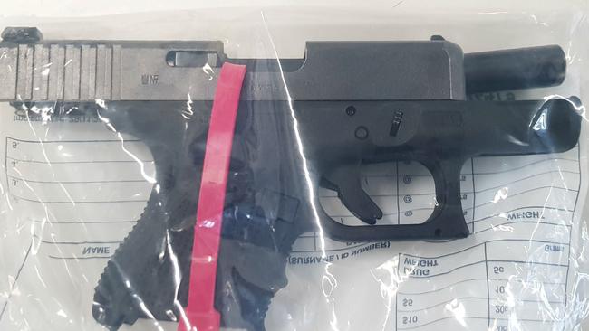 A firearm allegedly seized during the raids. Picture: SA Police