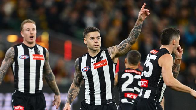 Jamie Elliott celebrates a goal against the Hawks. (Photo by Quinn Rooney/Getty Images)