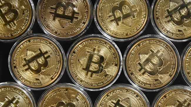 Losses to investment scams involving bitcoin have already reached $25.7 million this year. Picture: Ozan Kose/AFP