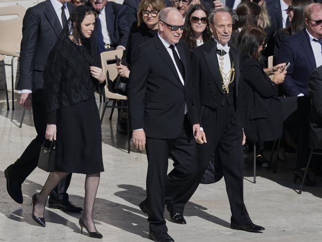 Monaco's Princess Charlene, with husband Prince Albert, also wore a veil at the funeral of Pope Francis. Picture: AP